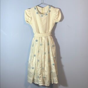 Vintage handmade girls puff sleeve white Cream Dress with Blue Floral rosette’s